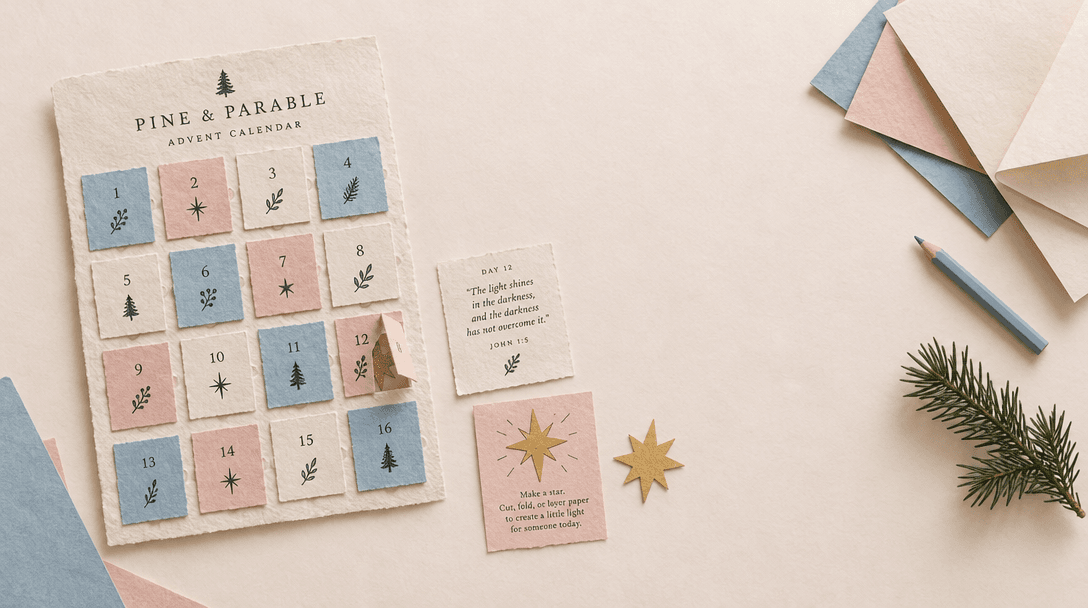 A handmade Advent calendar with a small paper door open beside a Scripture card and a star activity